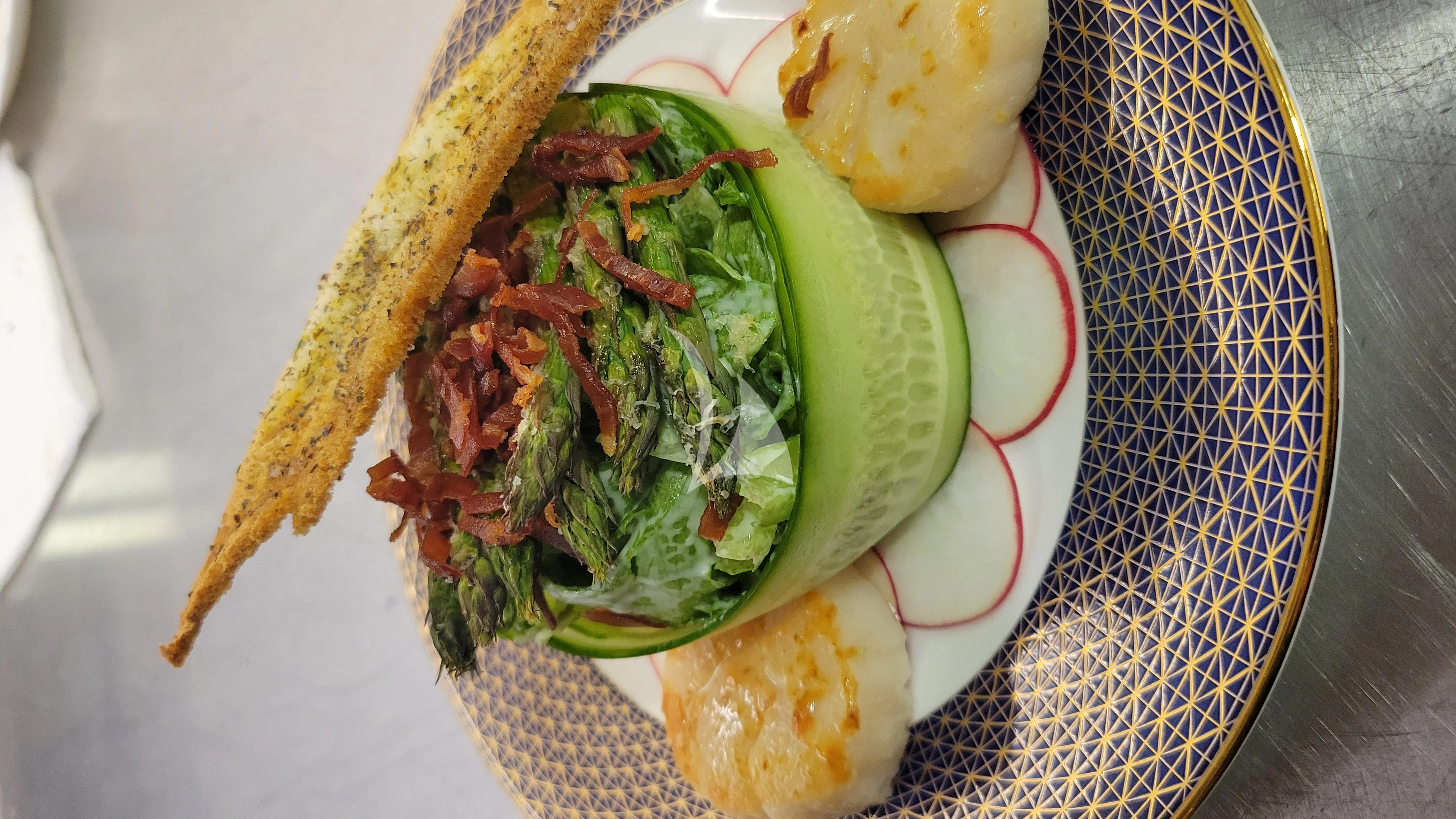 a sandwich with meat and vegetables aboard ENTREPRENEUR Yacht for Charter