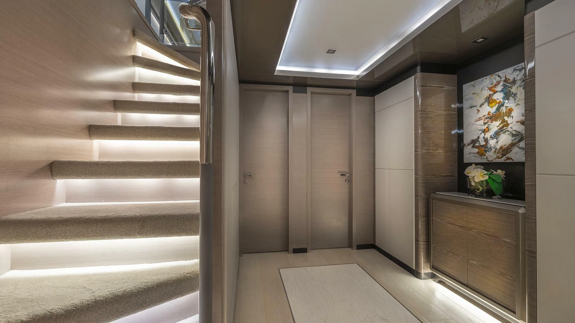 a room with a staircase and a plant on the wall aboard ENTREPRENEUR Yacht for Charter