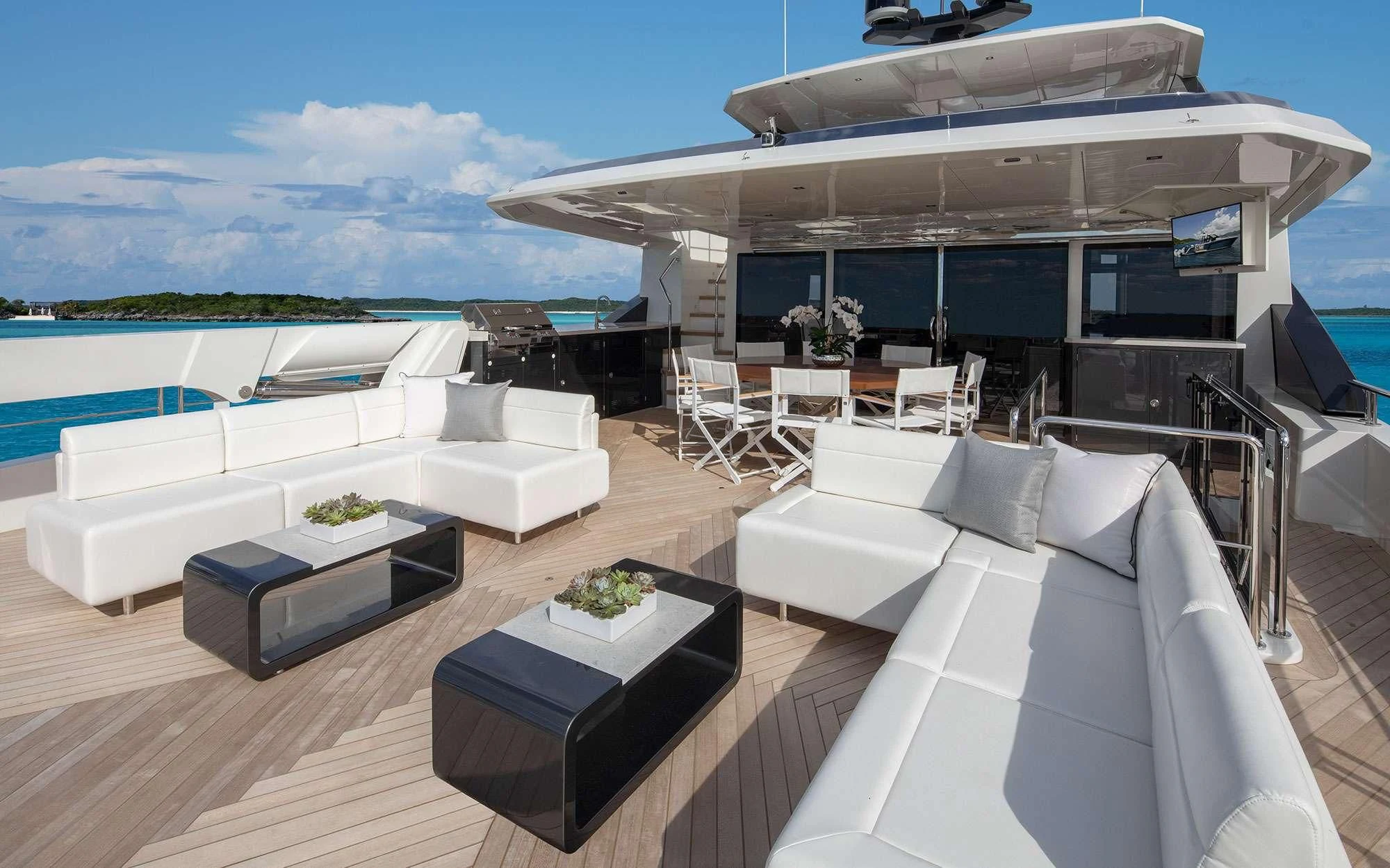 a room with a large bed and a pool aboard ENTREPRENEUR Yacht for Charter
