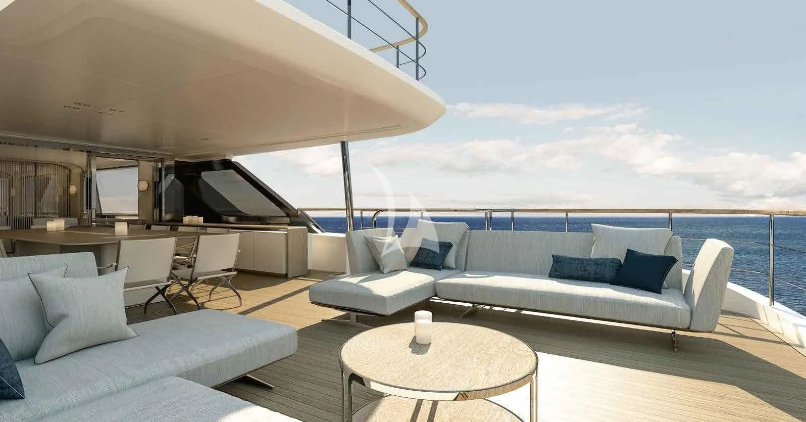 a living room with a large white sofa and a large white table aboard HAYAT Yacht for Sale