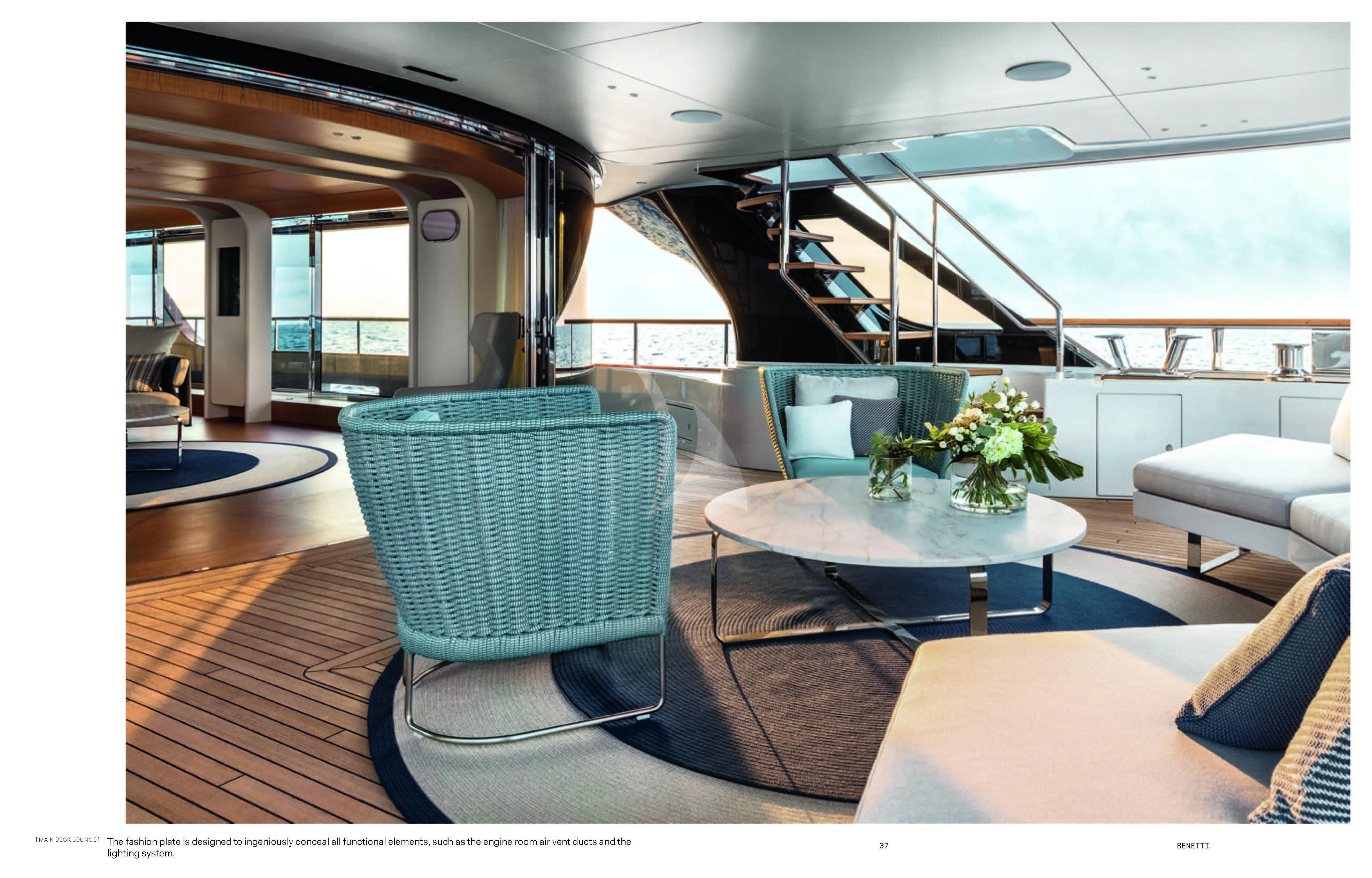 a room with a table and chairs aboard HAYAT Yacht for Sale