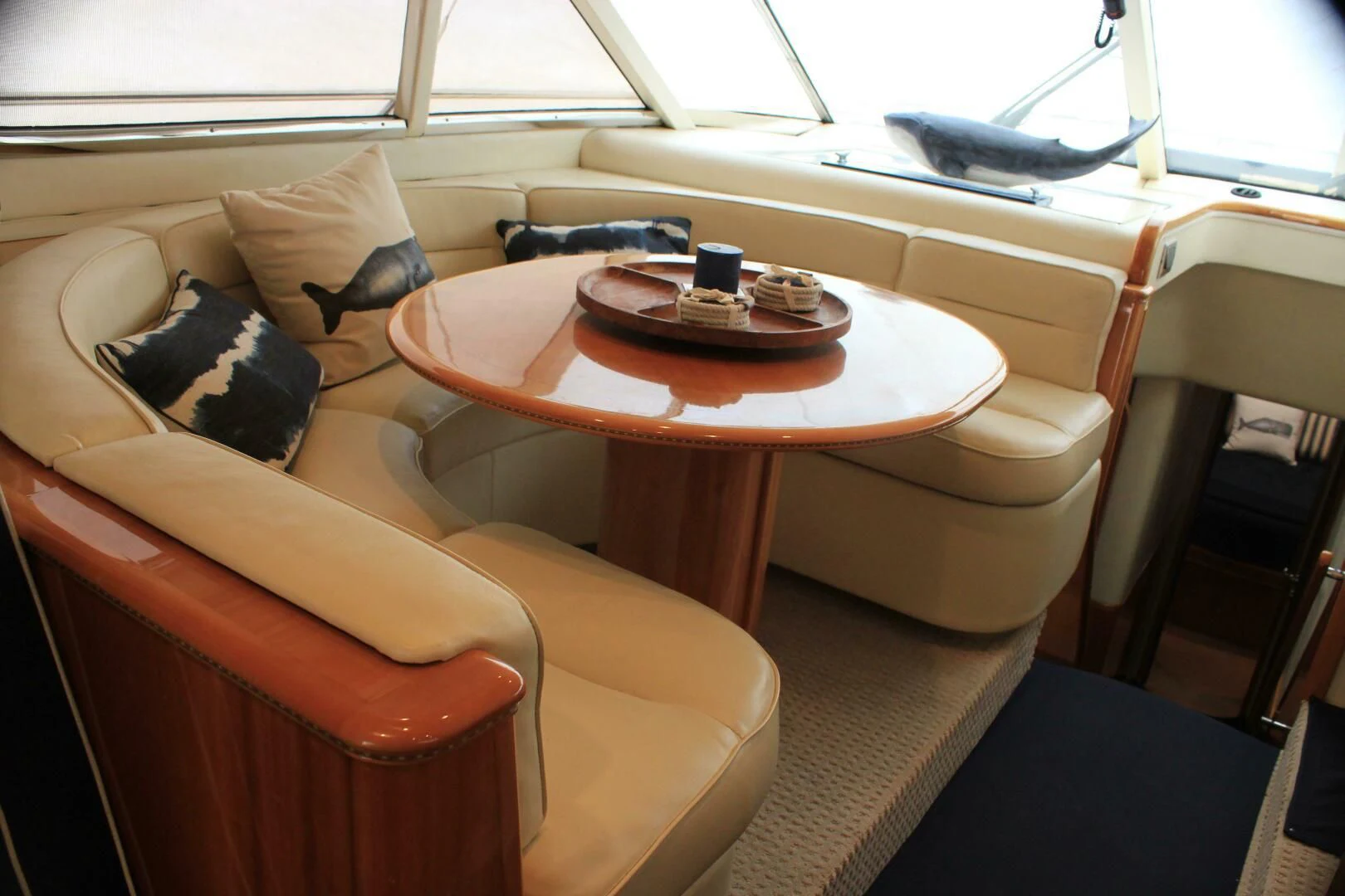 a table with a plate on it aboard JOIE DU ROI Yacht for Sale
