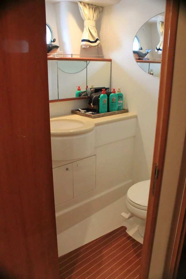 a bathroom with a sink and toilet aboard JOIE DU ROI Yacht for Sale