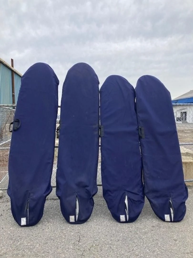 a group of black surfboards aboard JOIE DU ROI Yacht for Sale
