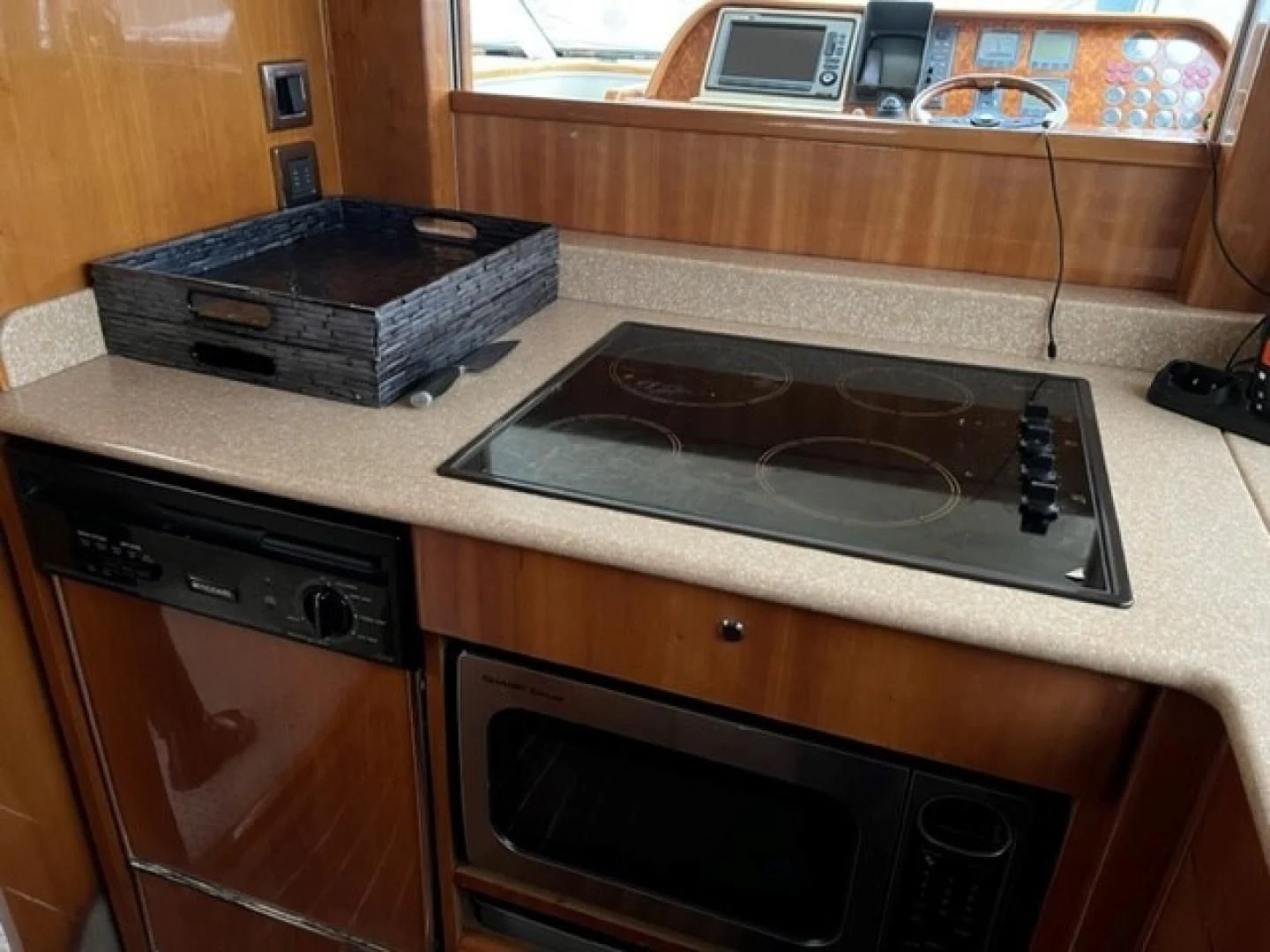 a stove top with a vent on top aboard JOIE DU ROI Yacht for Sale
