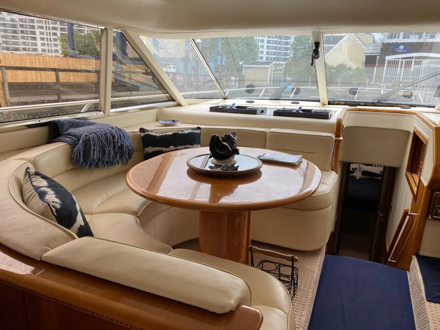 a table with a coffee table on it aboard JOIE DU ROI Yacht for Sale