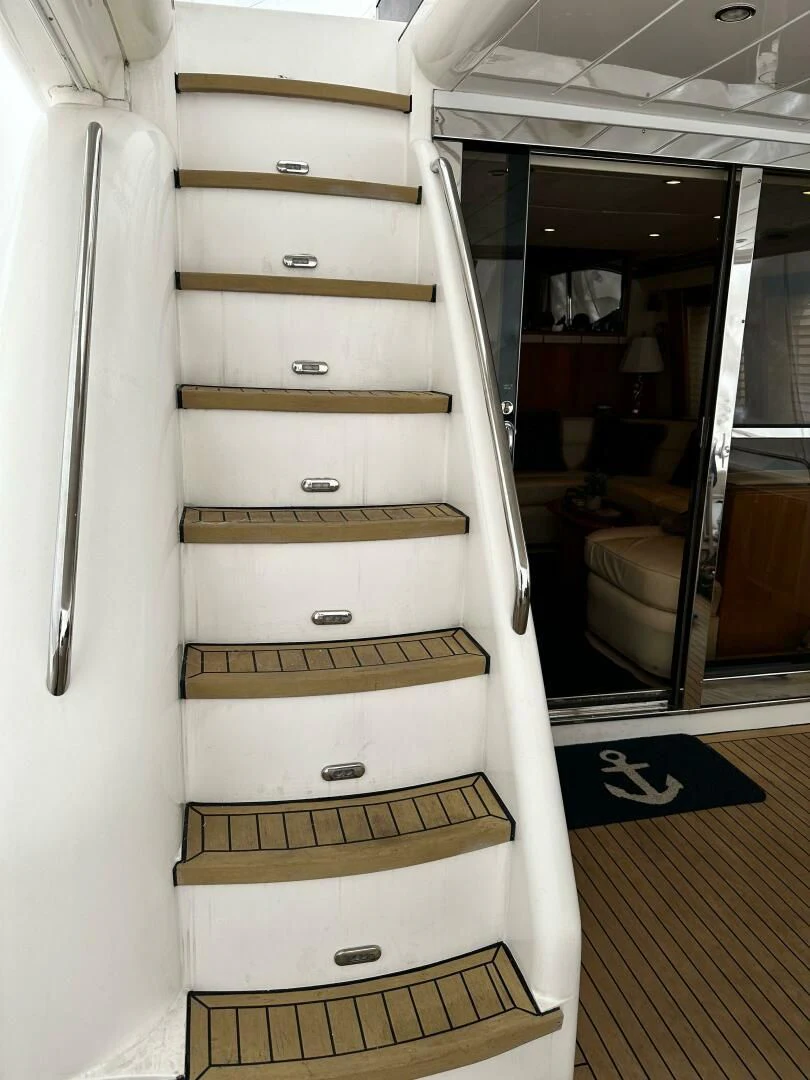 a white cabinet with drawers aboard JOIE DU ROI Yacht for Sale