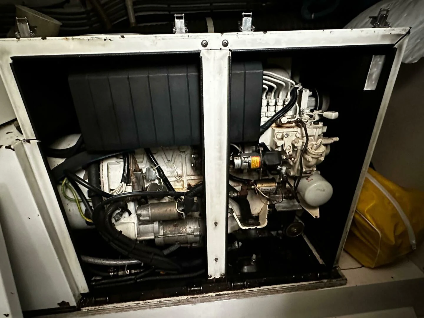 a machine with a large metal cylinder aboard JOIE DU ROI Yacht for Sale