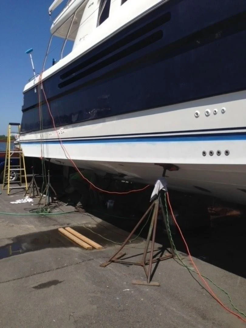 a boat tied to a dock aboard JOIE DU ROI Yacht for Sale