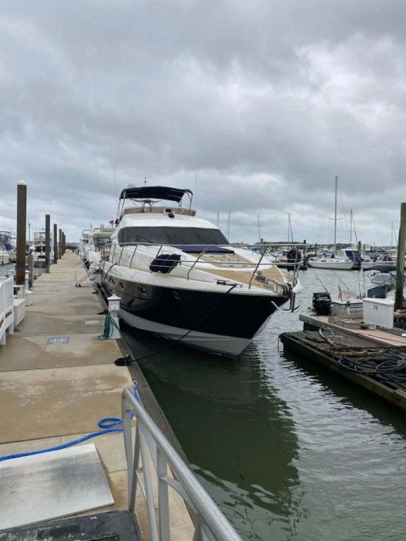a boat docked at a pier aboard JOIE DU ROI Yacht for Sale
