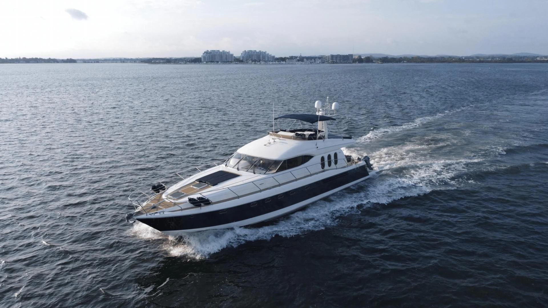 a white yacht in the water aboard JOIE DU ROI Yacht for Sale