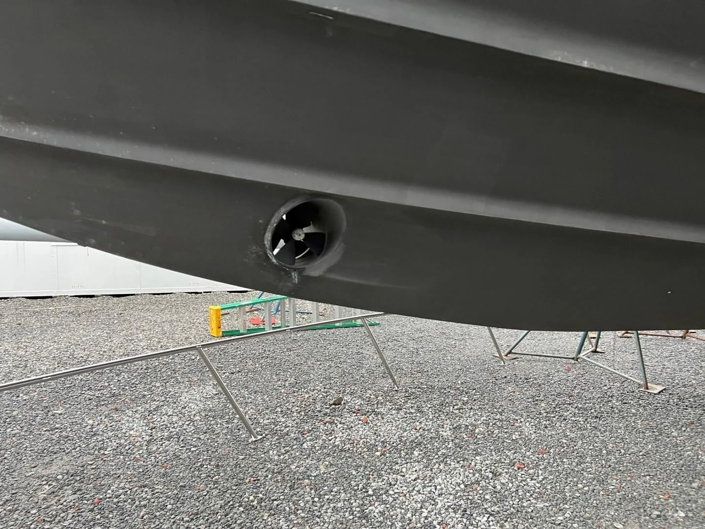 a green and yellow object under a car aboard JOIE DU ROI Yacht for Sale