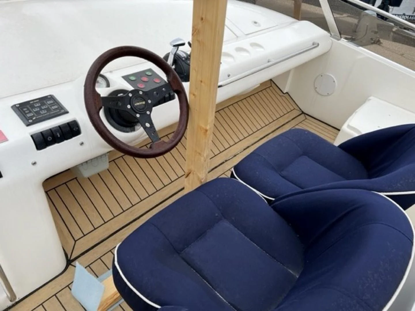 a guitar on a stand aboard JOIE DU ROI Yacht for Sale