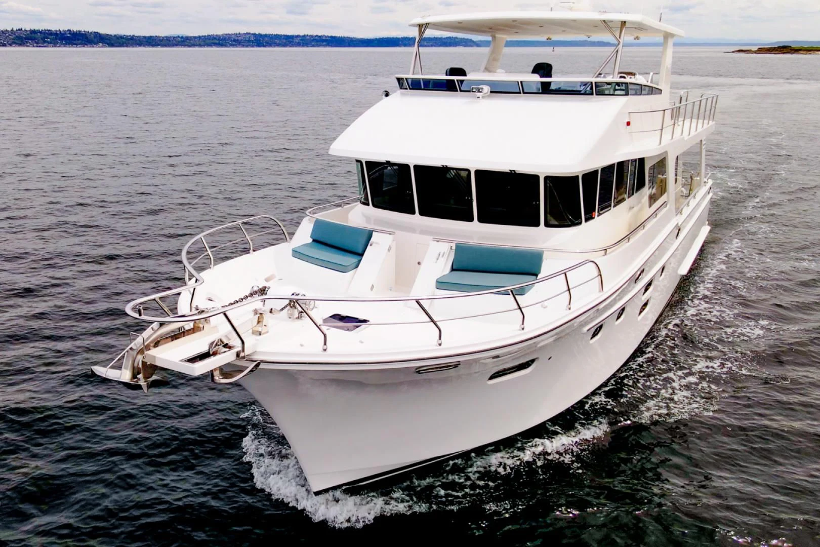 a white boat in the water aboard MAHALO Yacht for Sale