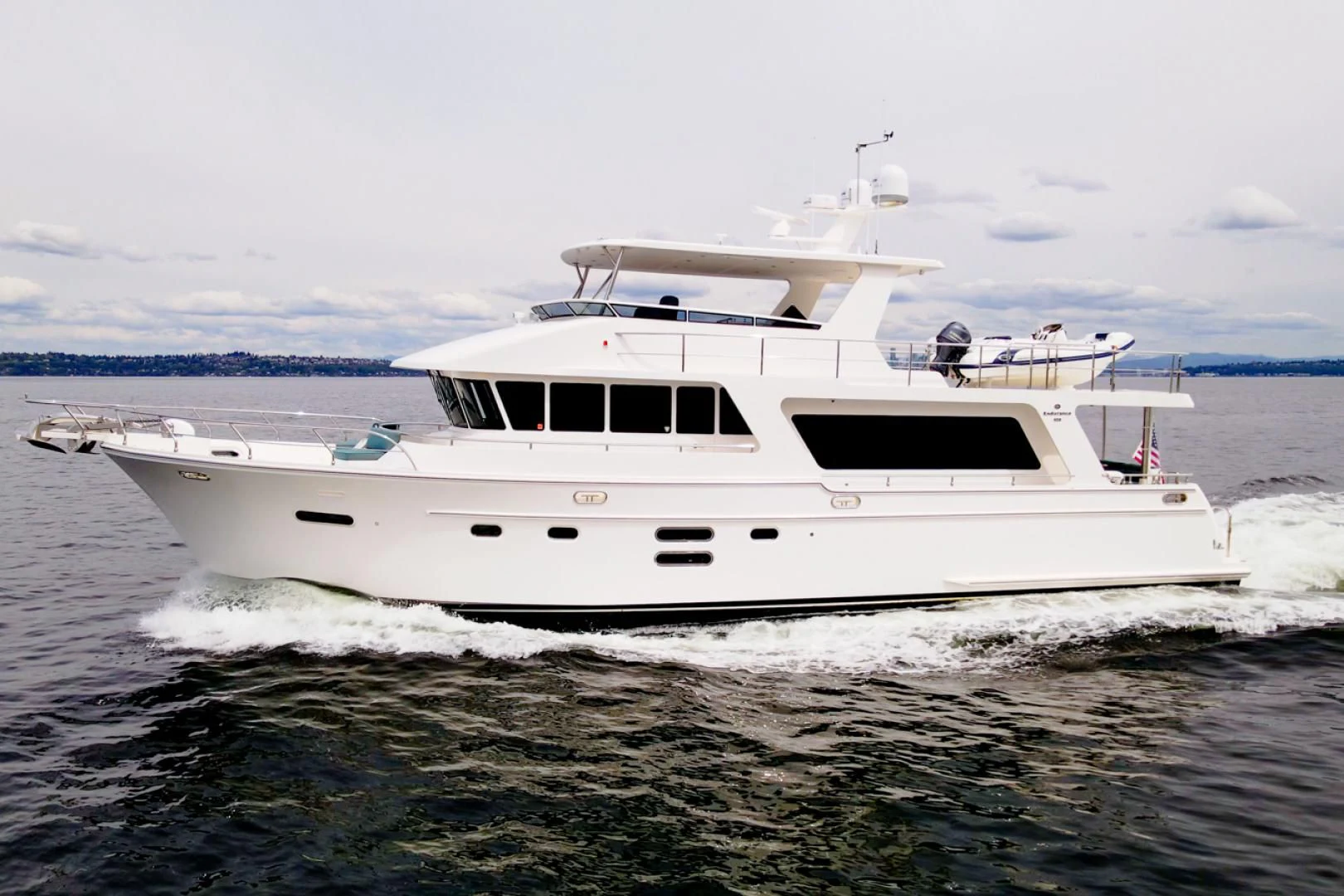 a white yacht in the water aboard MAHALO Yacht for Sale