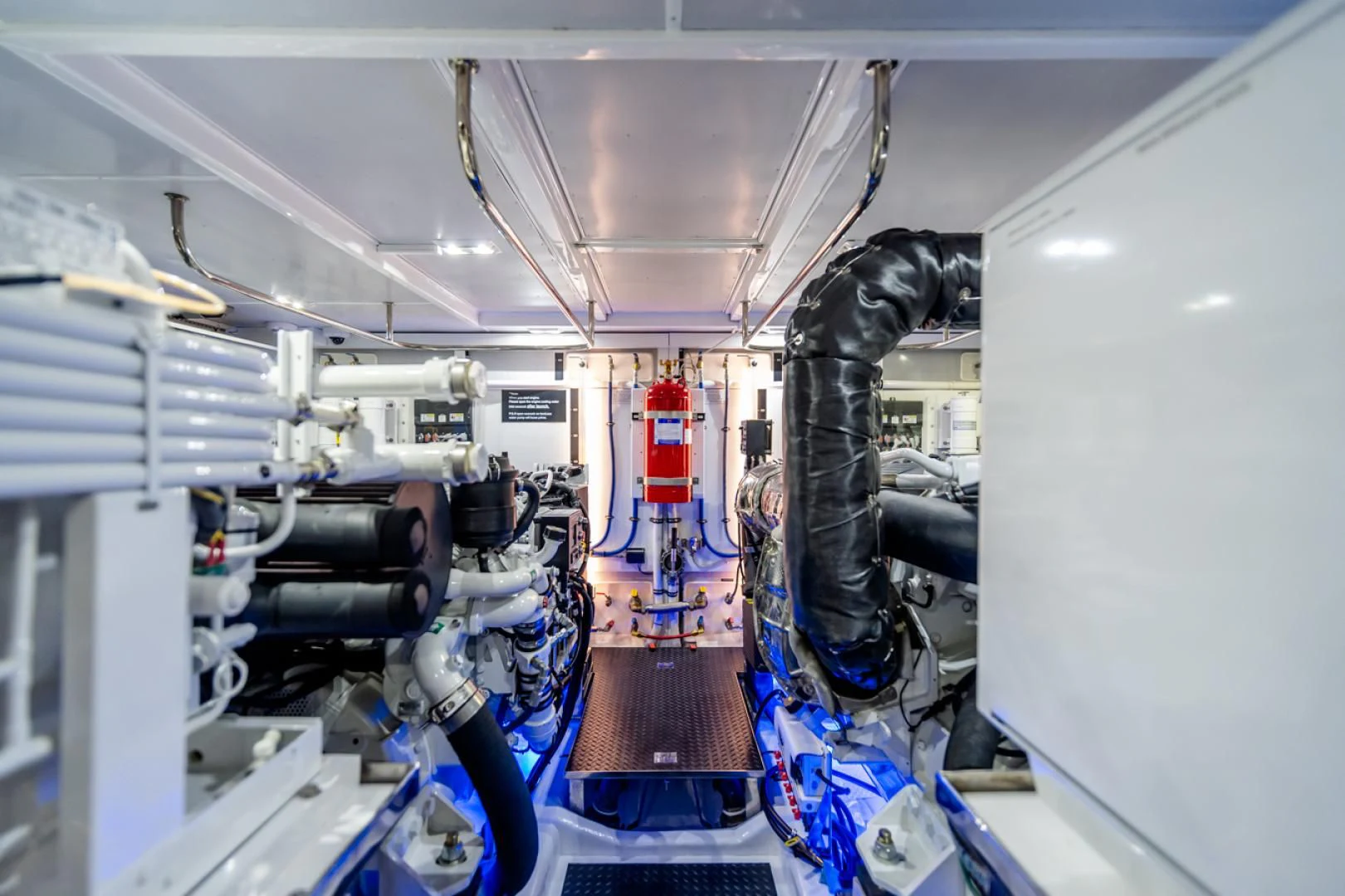 a room with a machine aboard MAHALO Yacht for Sale