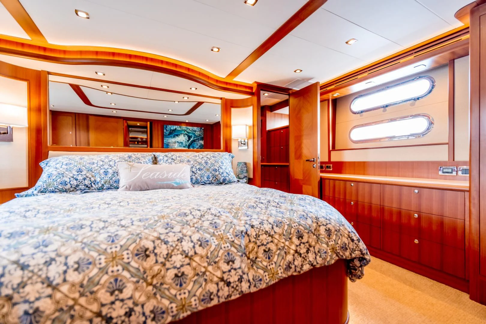 a bed in a room aboard MAHALO Yacht for Sale