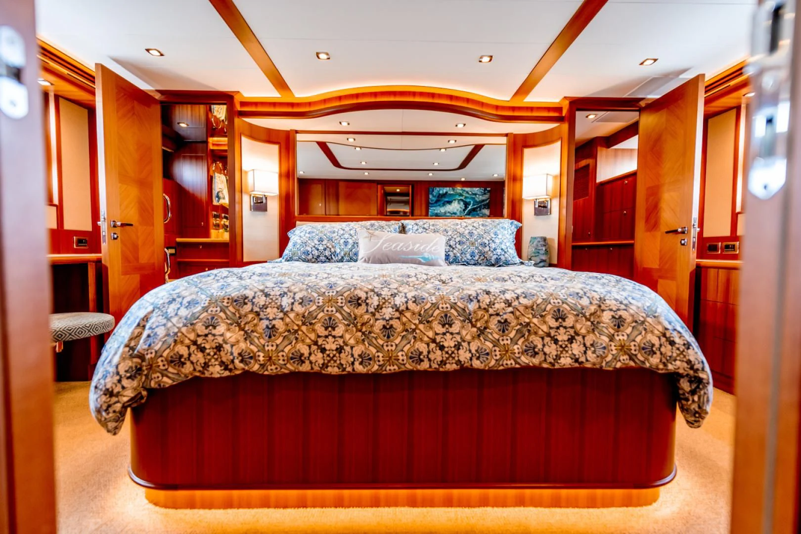 a bed in a room aboard MAHALO Yacht for Sale
