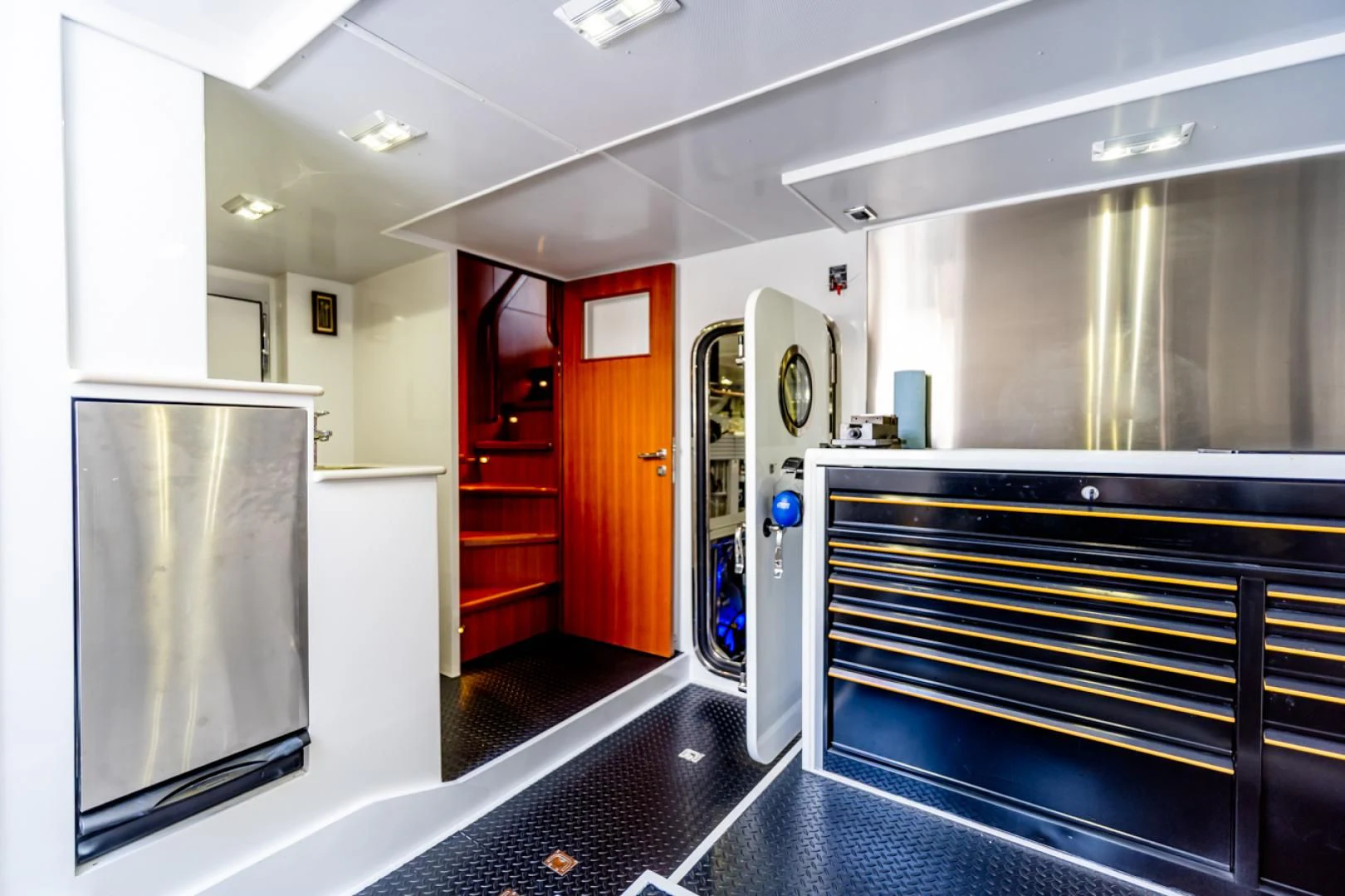 a room with a large mirror and a large oven aboard MAHALO Yacht for Sale
