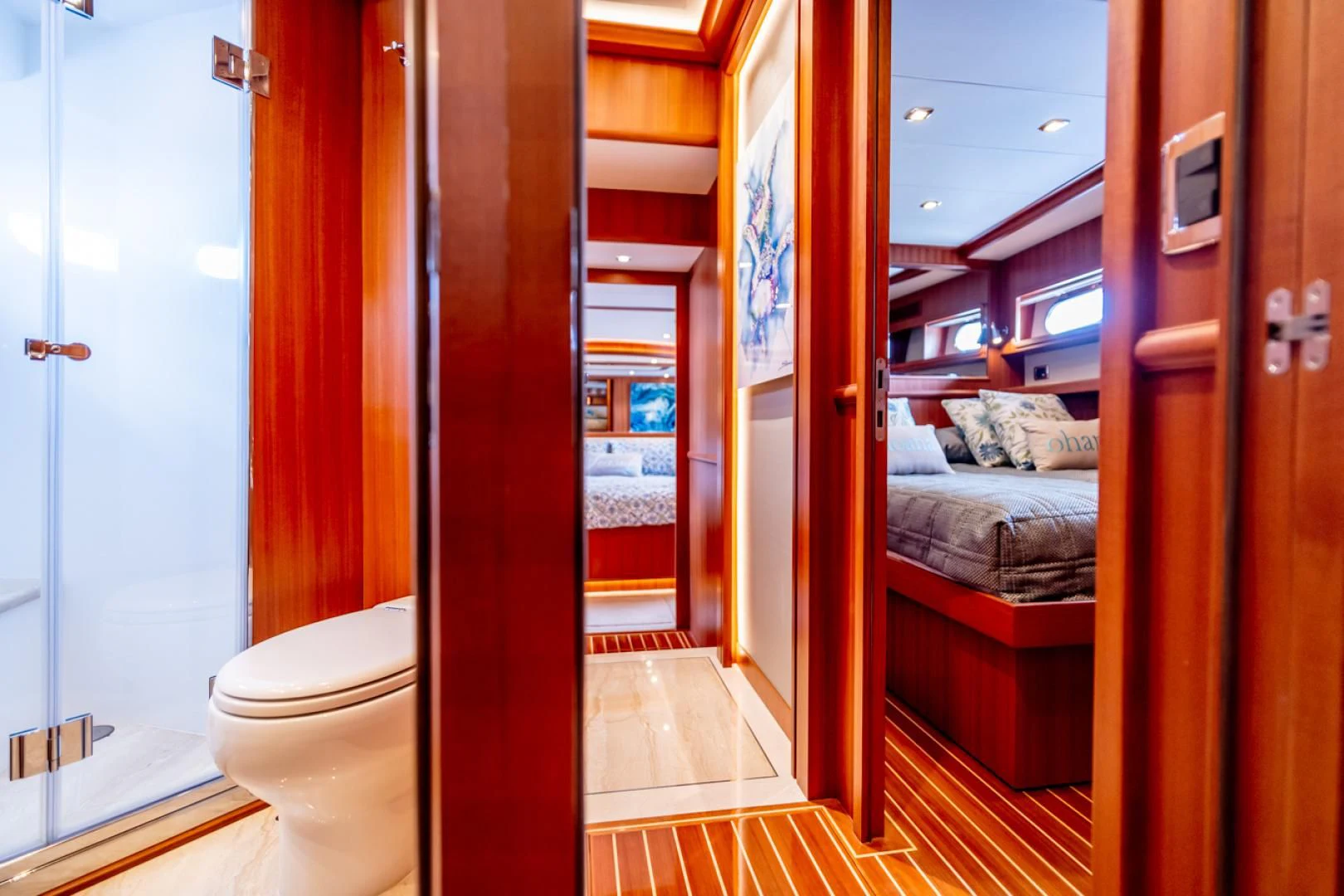 a bathroom with a glass door aboard MAHALO Yacht for Sale