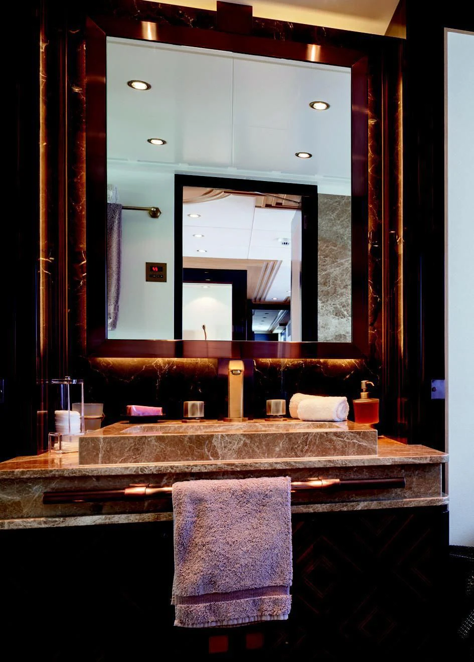 a bathroom with a large mirror aboard TAURICA Yacht for Sale