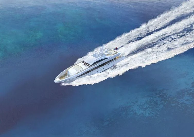 a small white boat in the water aboard TAURICA Yacht for Sale