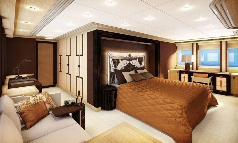 a room with a bed and a couch aboard TAURICA Yacht for Sale