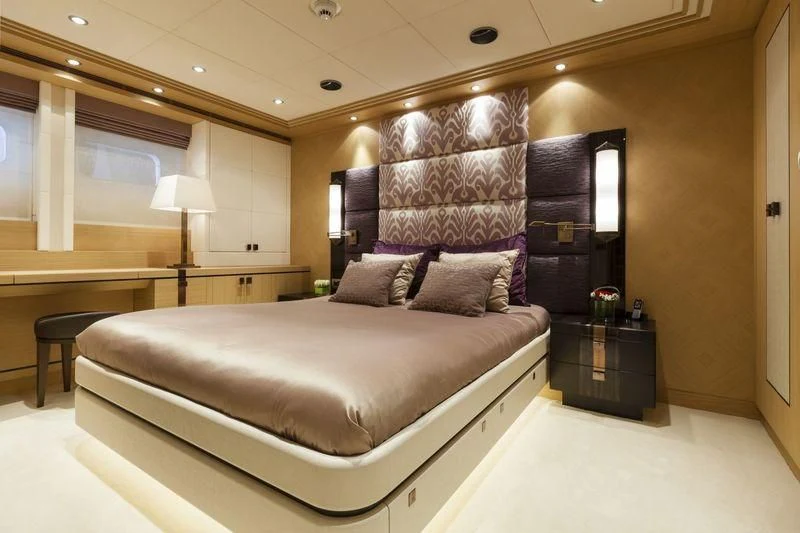a bed in a room aboard TAURICA Yacht for Sale