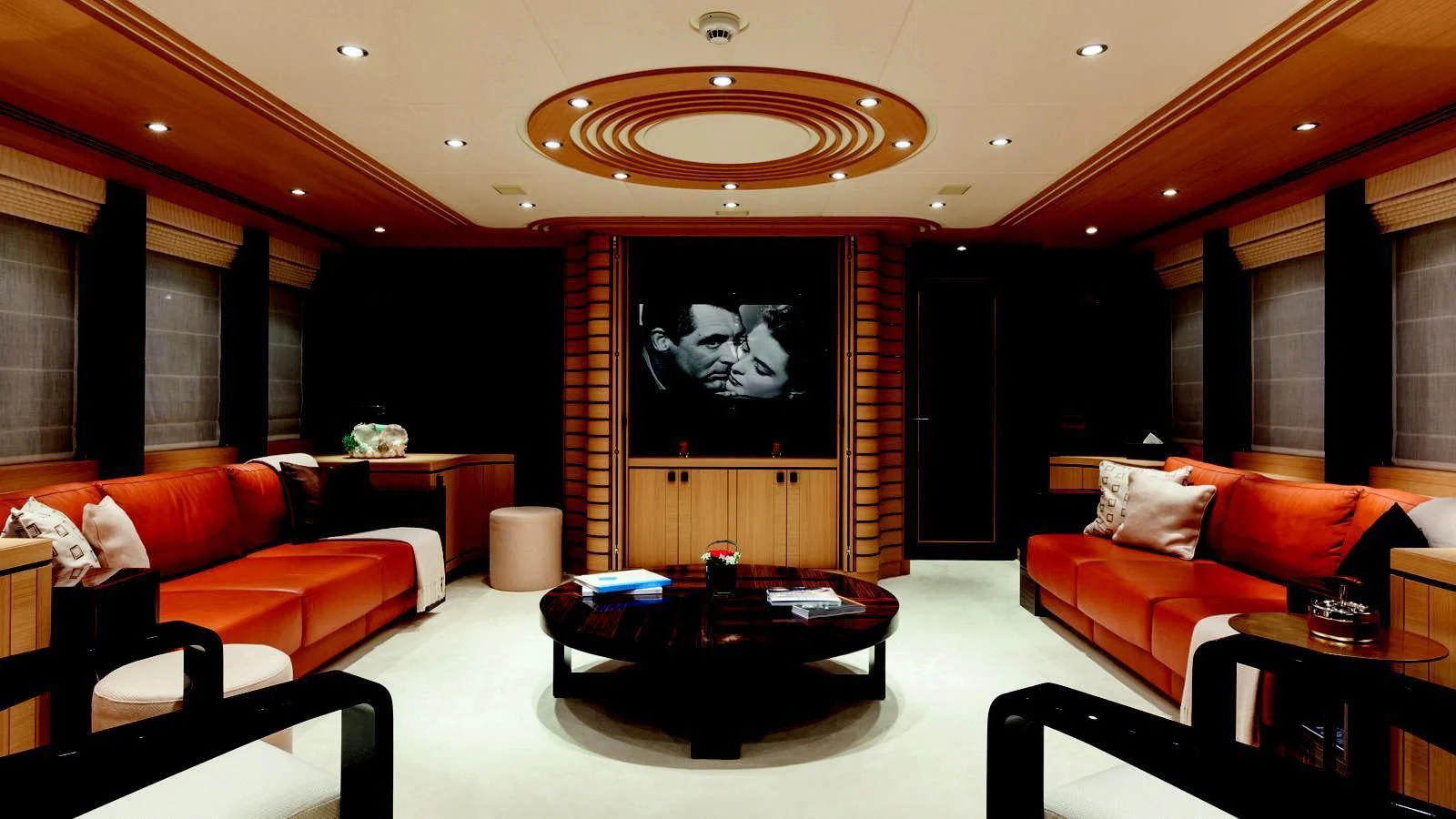 a room with a large screen aboard TAURICA Yacht for Sale
