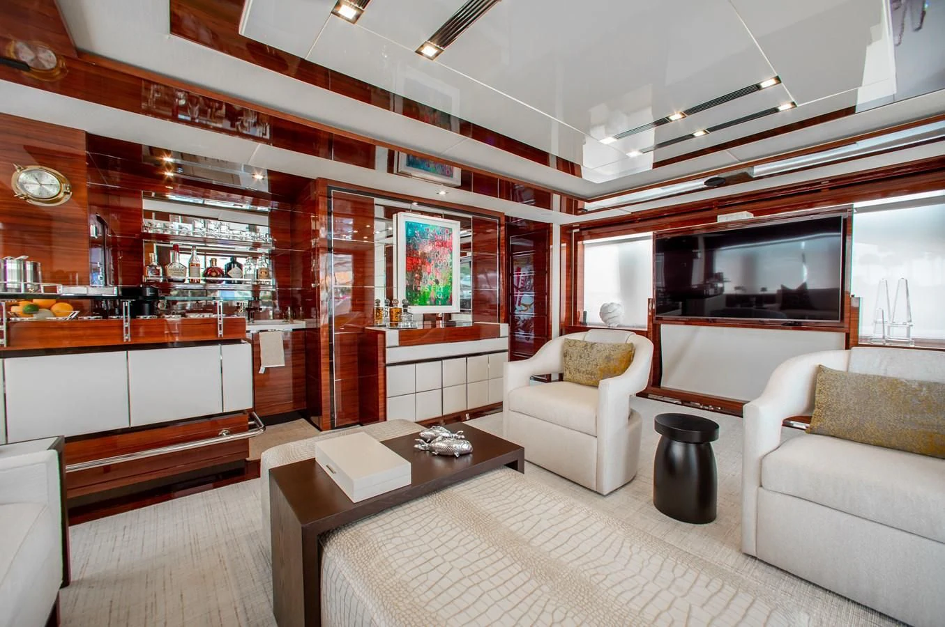 a living room with a couch and a coffee table aboard ALLORA Yacht for Sale