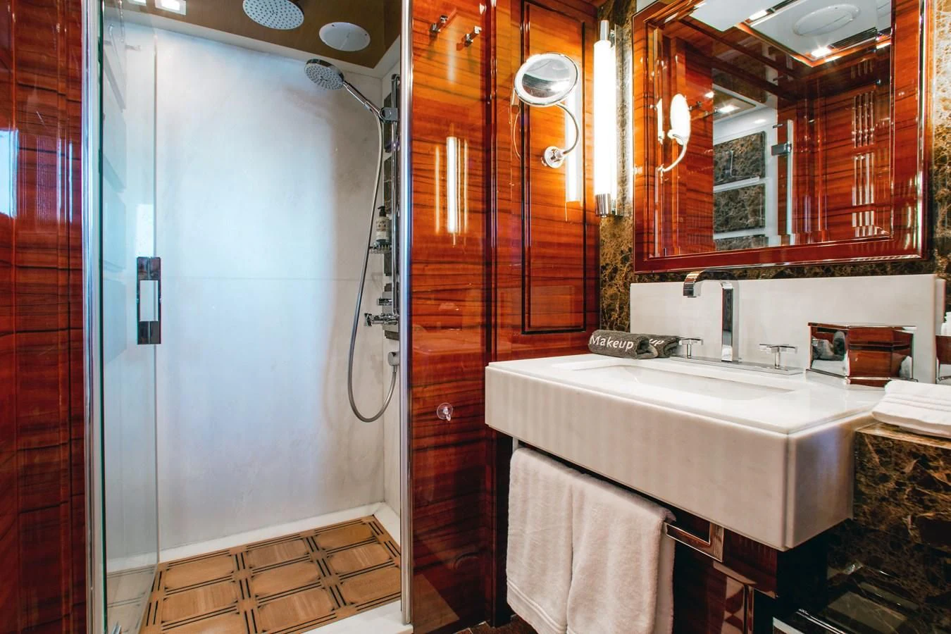 a bathroom with a sink and a mirror aboard ALLORA Yacht for Sale