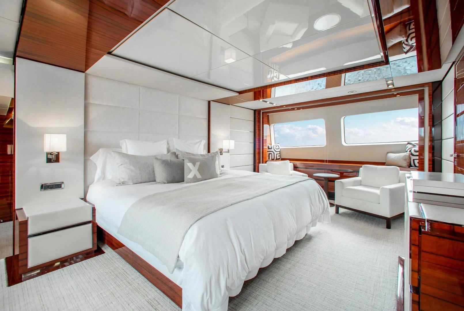 a large bedroom with a large bed aboard ALLORA Yacht for Sale