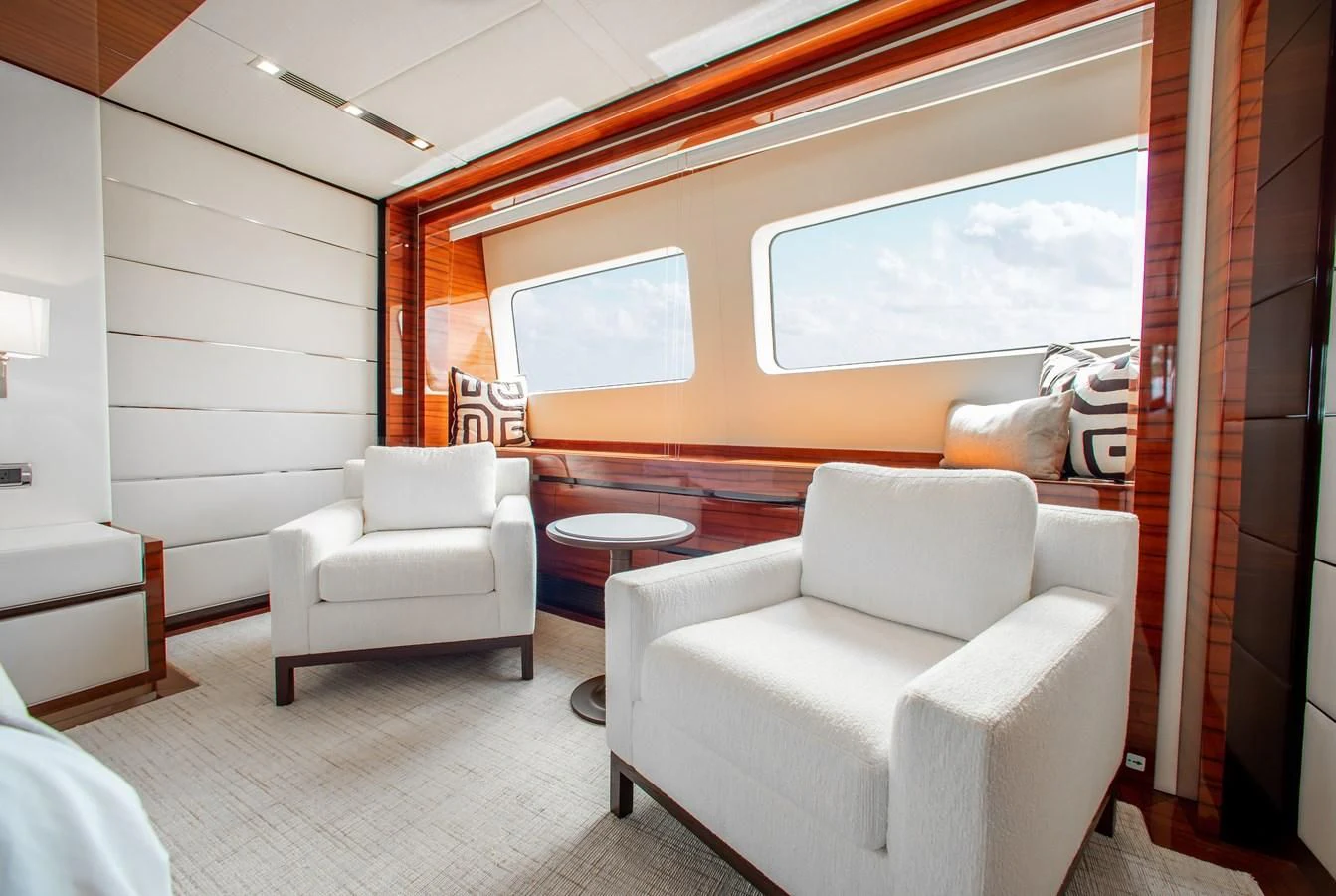 a room with a couch and a table aboard ALLORA Yacht for Sale