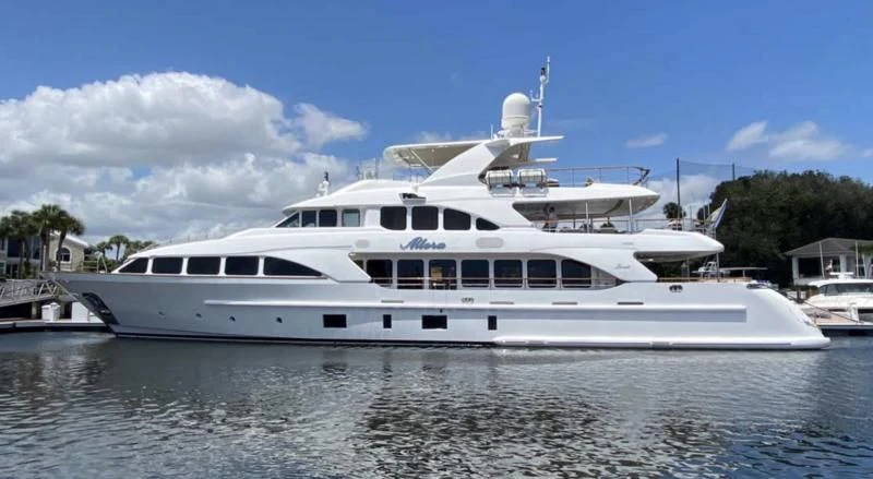 a white yacht in the water aboard ALLORA Yacht for Sale