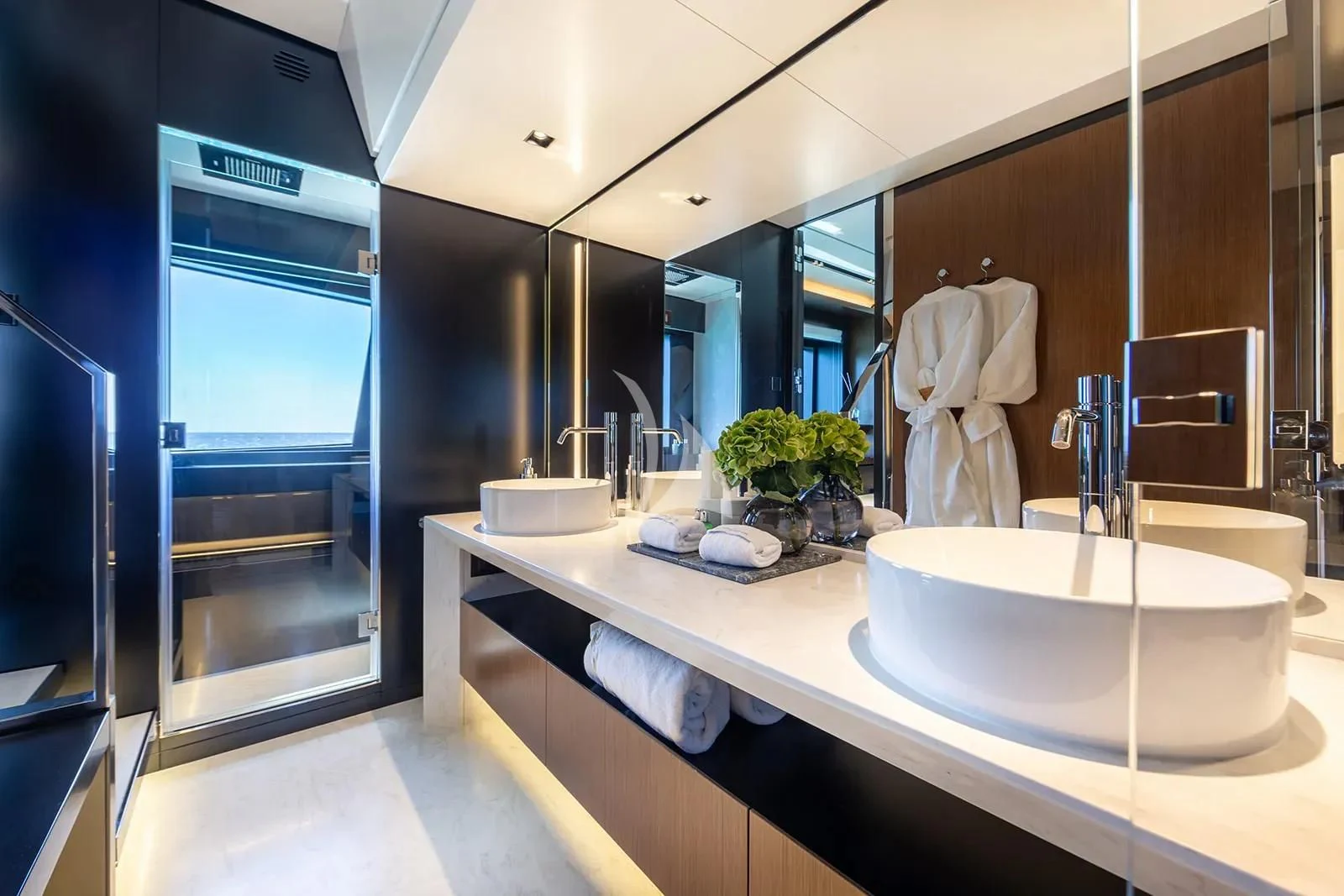 a bathroom with a sink and a mirror aboard LEMON NOT LIME Yacht for Sale