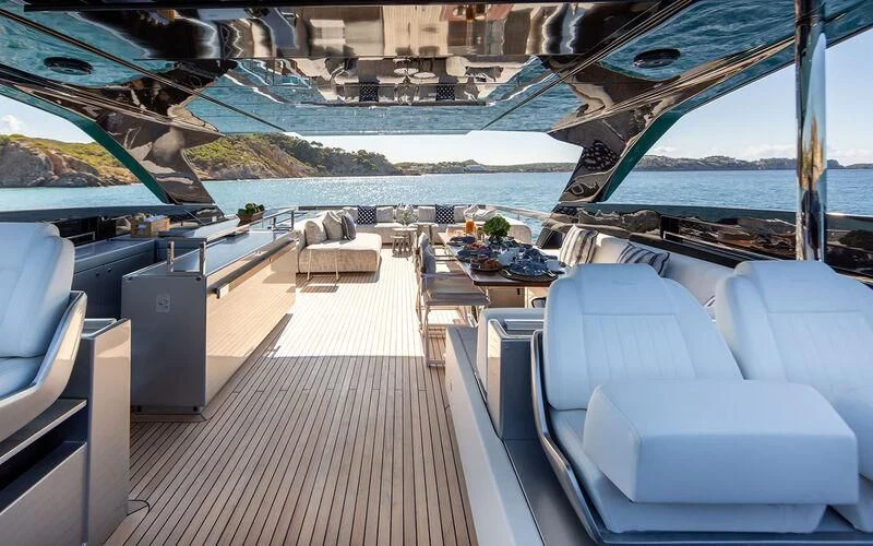a deck with a view of a city and water aboard LEMON NOT LIME Yacht for Sale