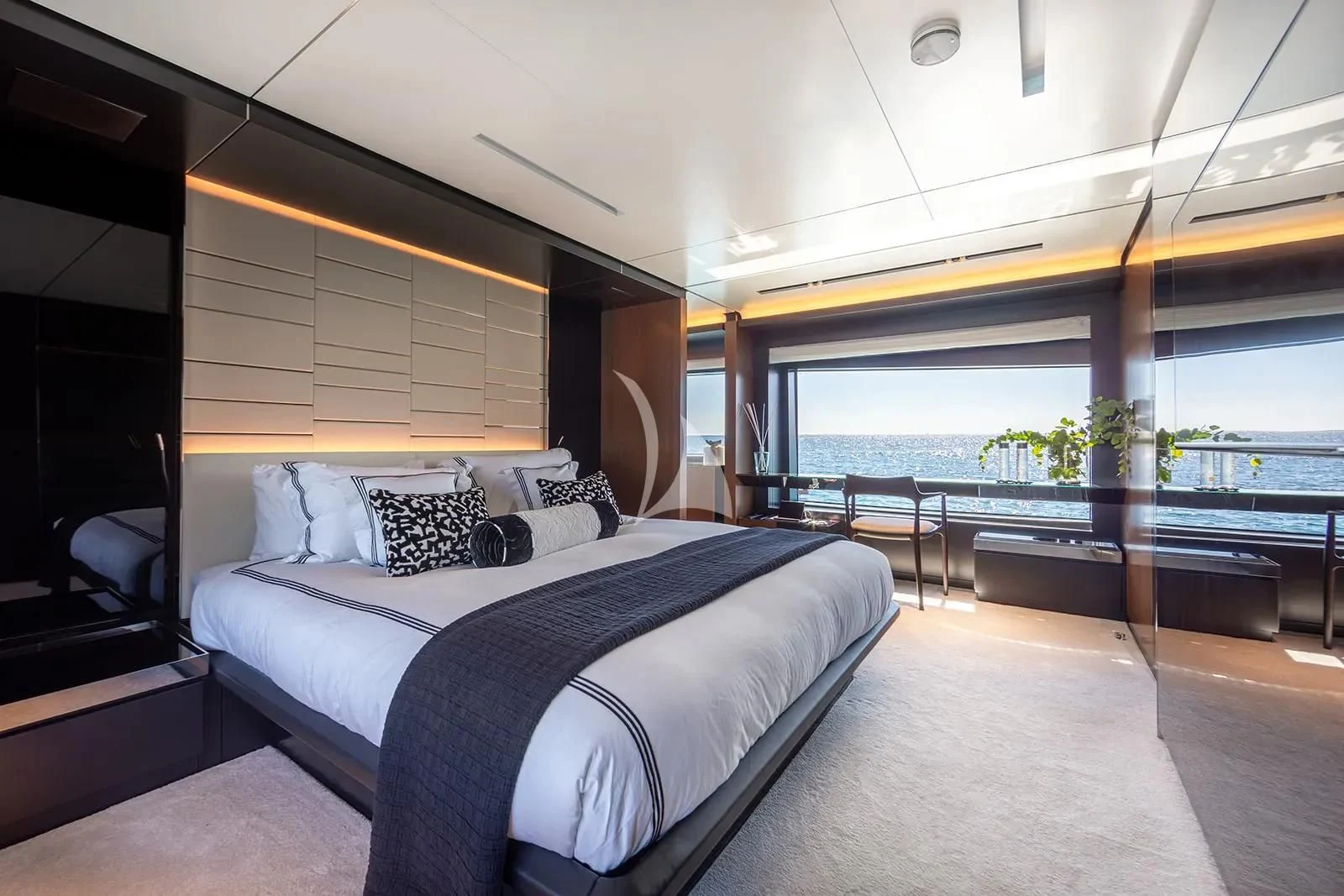 a bed in a room aboard LEMON NOT LIME Yacht for Sale
