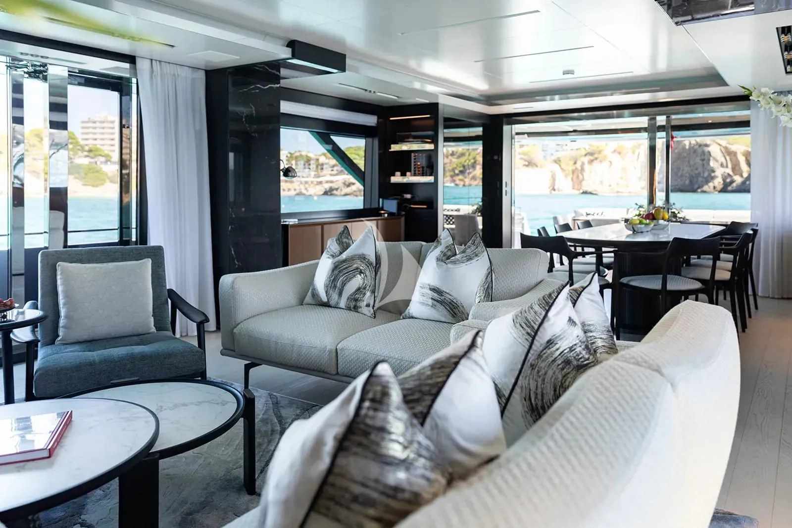 a living room with a large window aboard LEMON NOT LIME Yacht for Sale