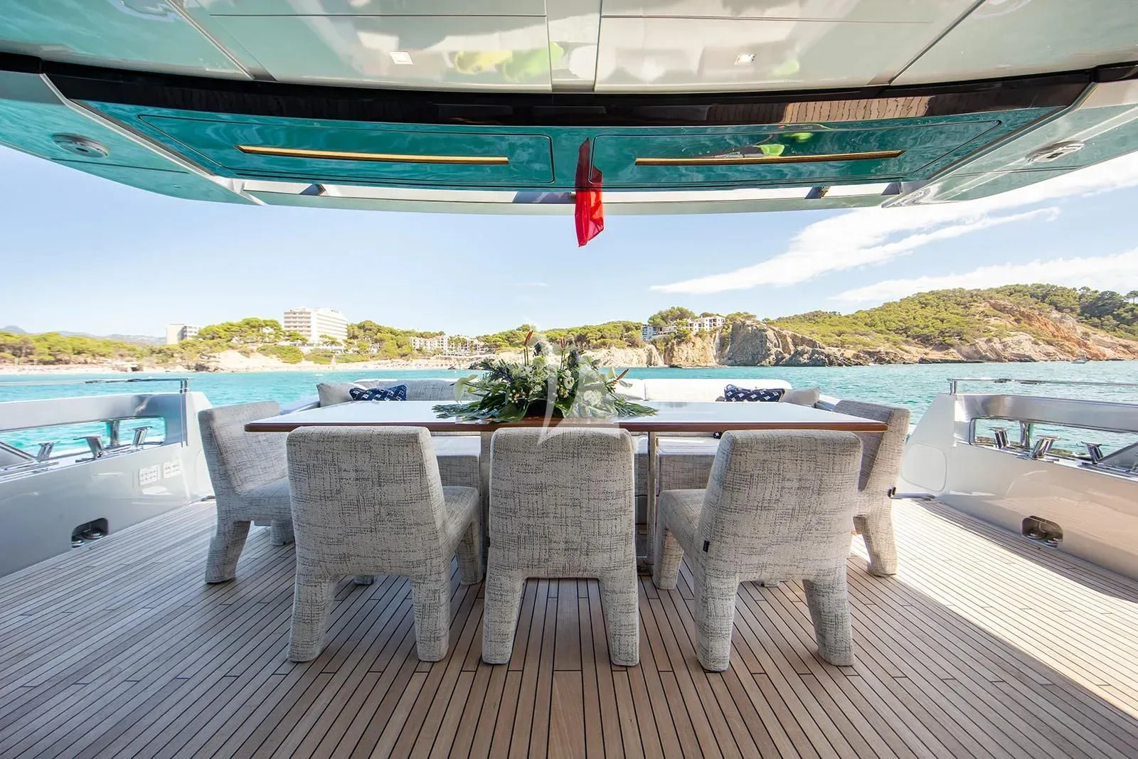 a table and chairs on a deck aboard LEMON NOT LIME Yacht for Sale