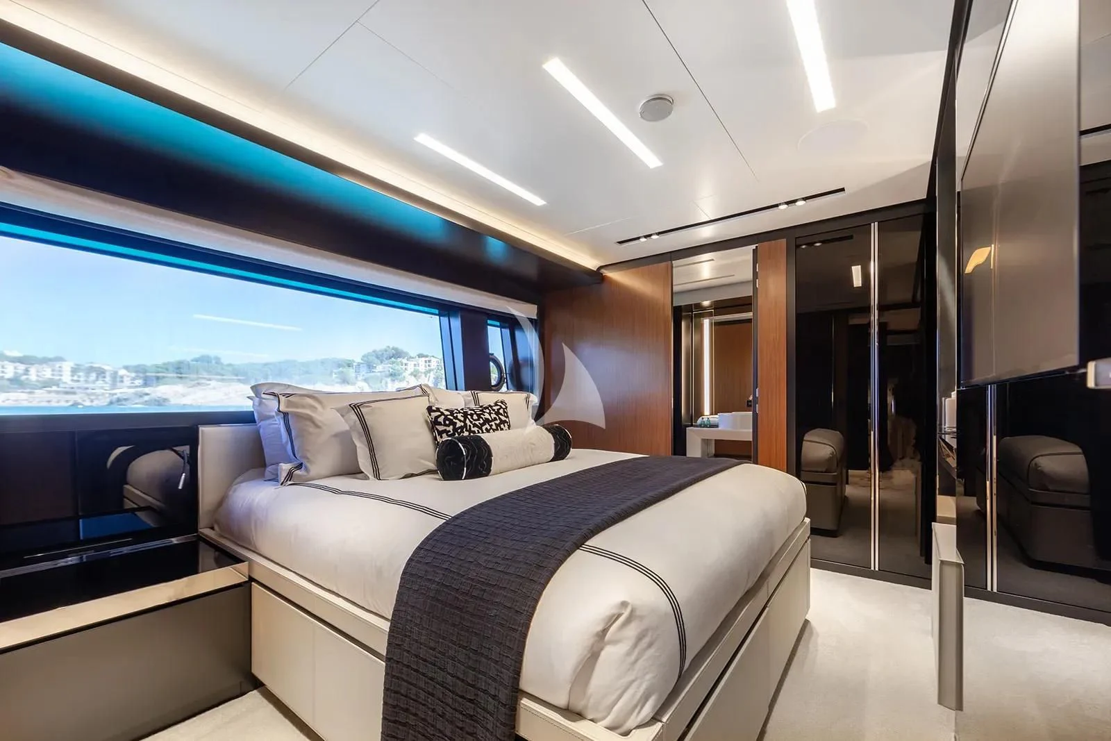 a bed in a room aboard LEMON NOT LIME Yacht for Sale
