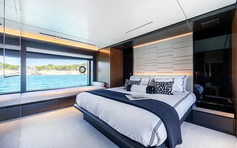 a large bed in a room aboard LEMON NOT LIME Yacht for Sale