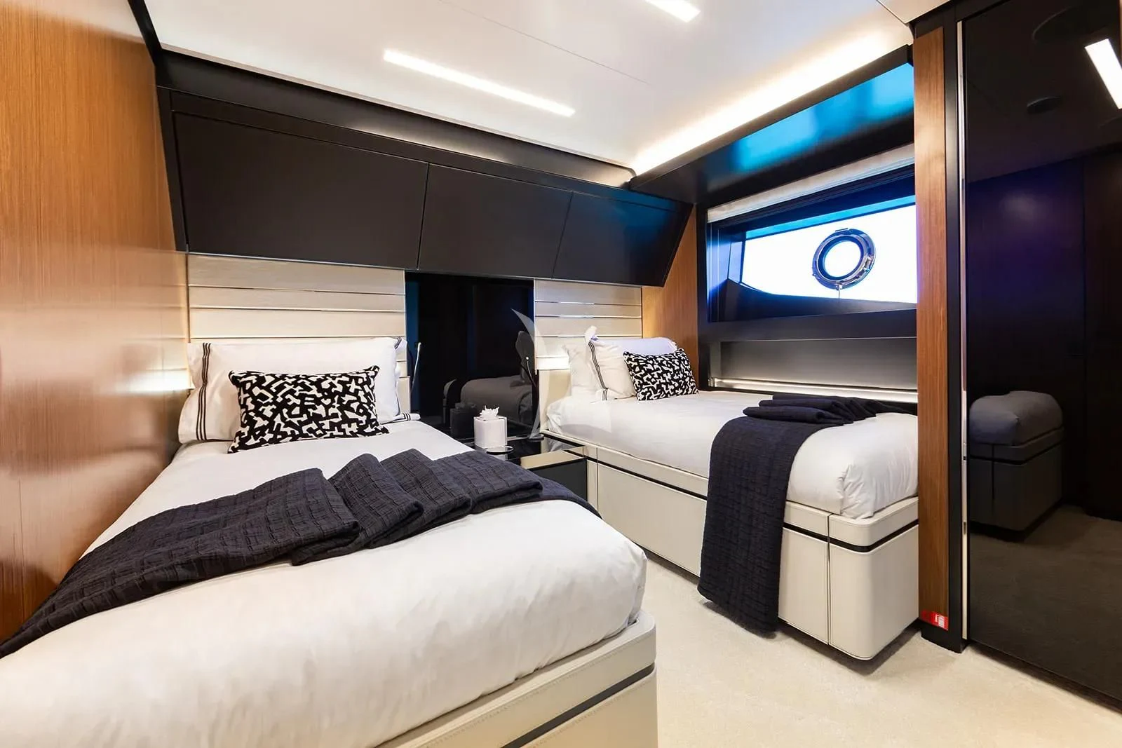 a room with two beds aboard LEMON NOT LIME Yacht for Sale