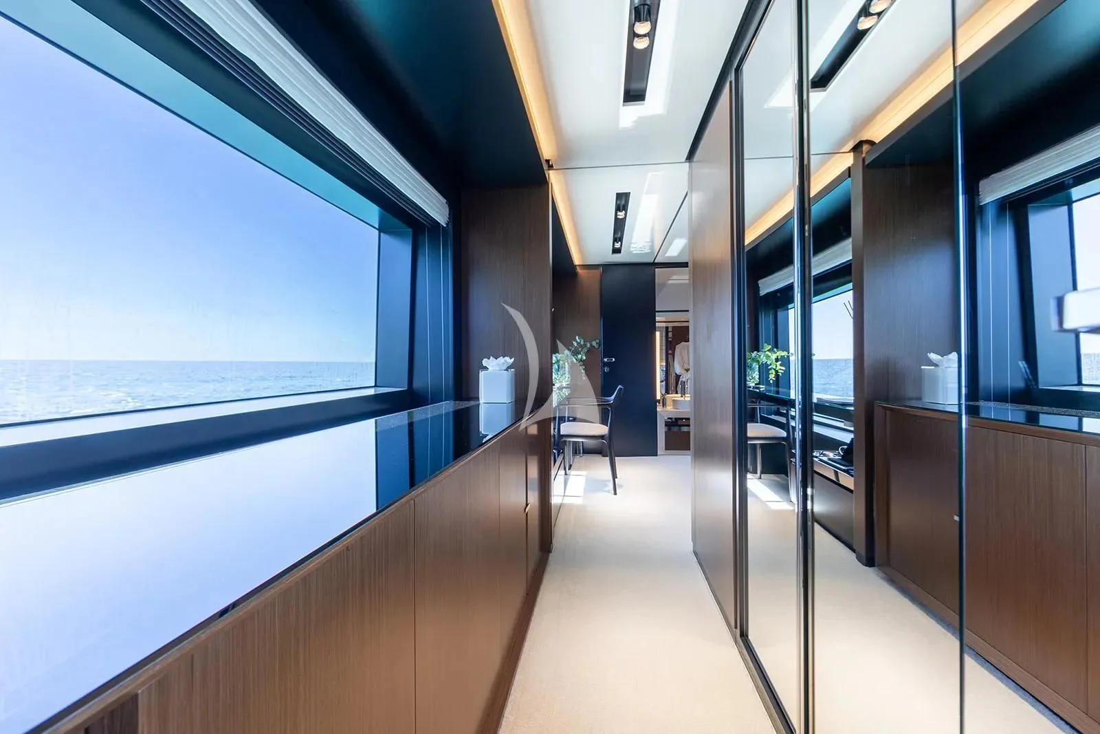 a room with a large window and a view of the water aboard LEMON NOT LIME Yacht for Sale