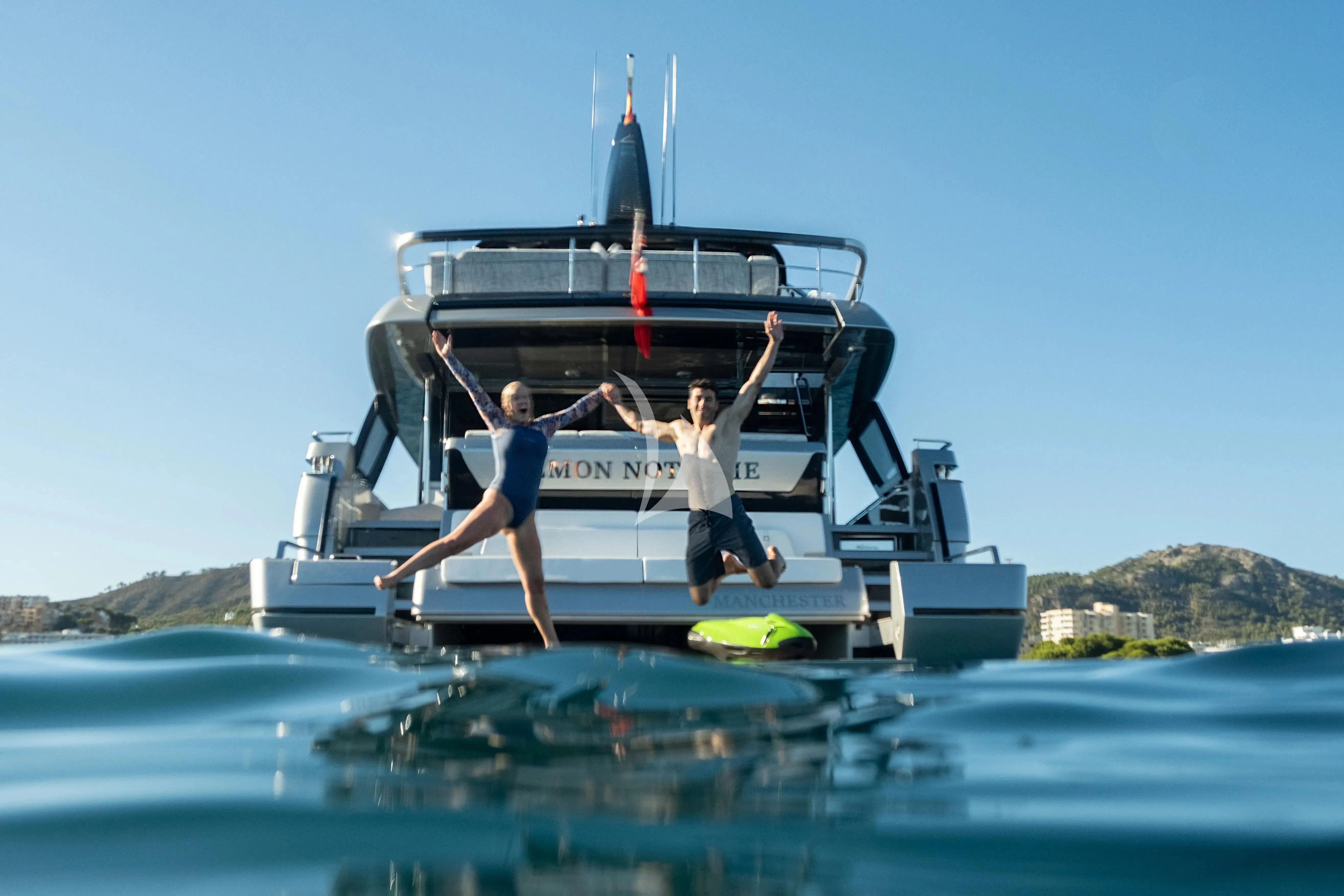 a group of people on a boat aboard LEMON NOT LIME Yacht for Sale