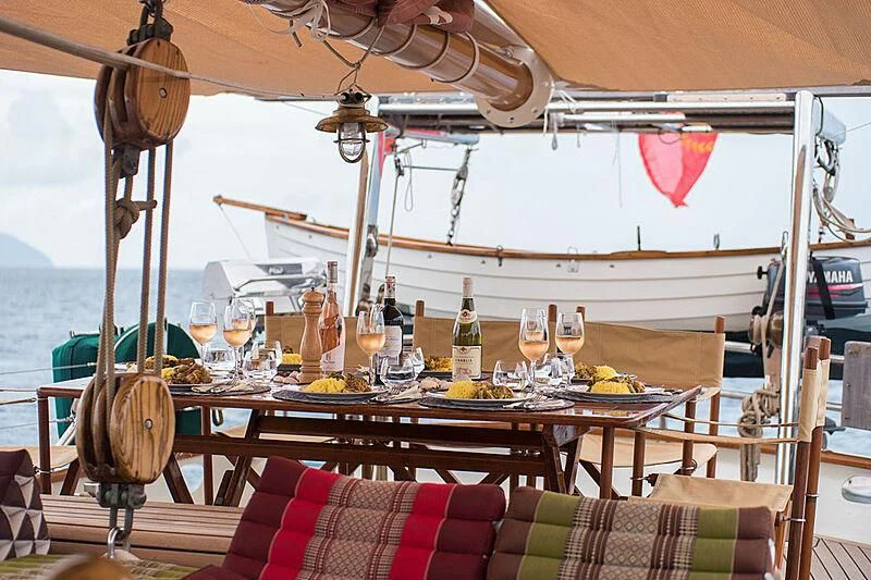 a table set for a meal aboard DALLINGHOO Yacht for Sale