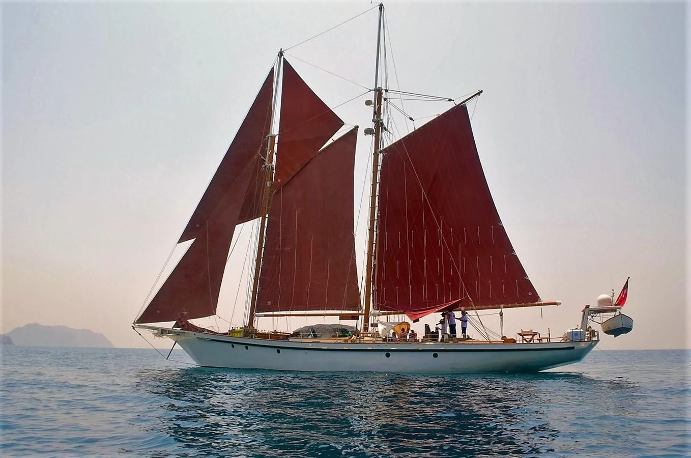 a sailboat on the water aboard DALLINGHOO Yacht for Sale