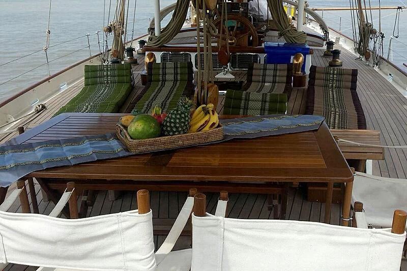 a boat with fruit on it aboard DALLINGHOO Yacht for Sale
