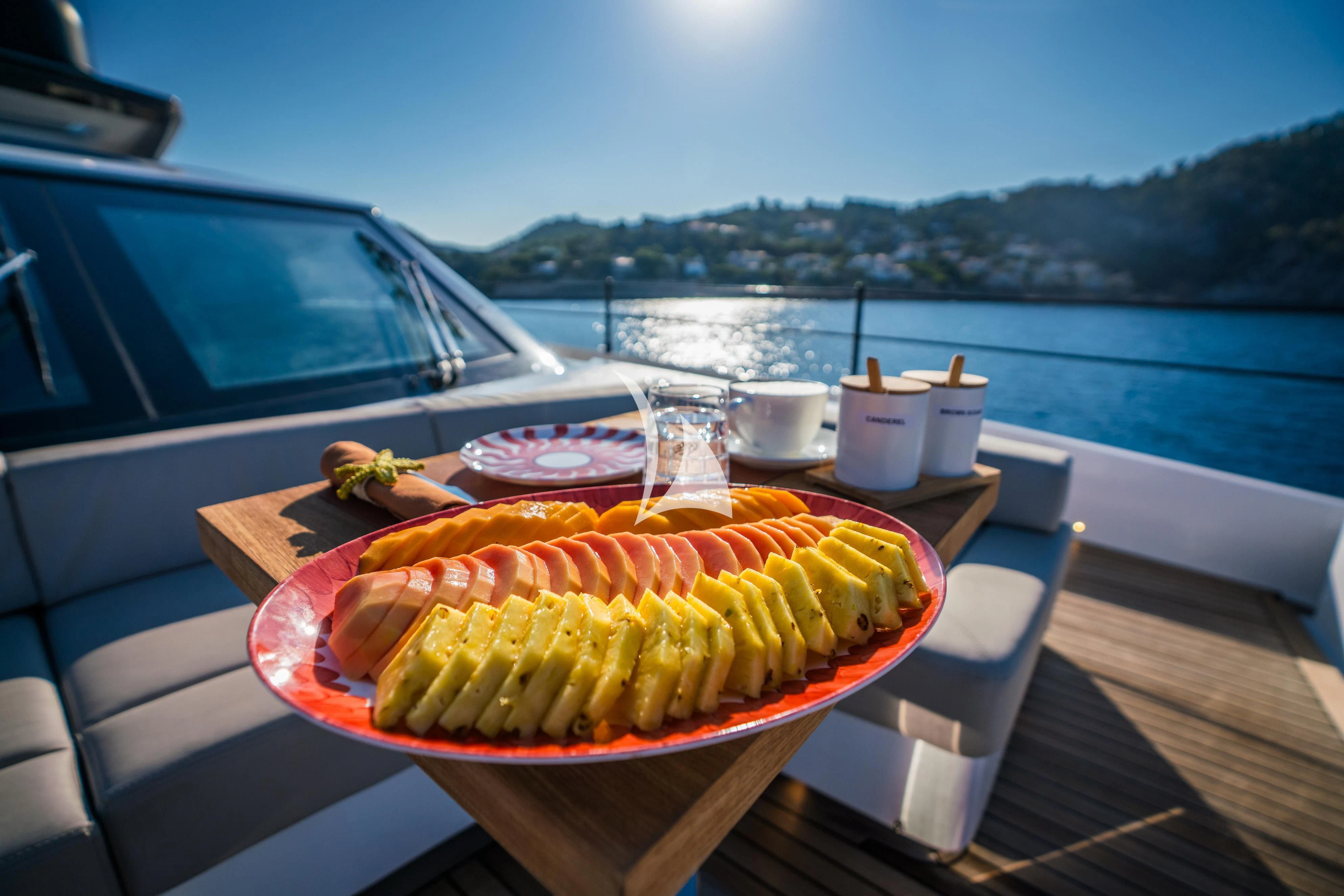 a plate of food on a boat aboard ALVIUM Yacht for Sale