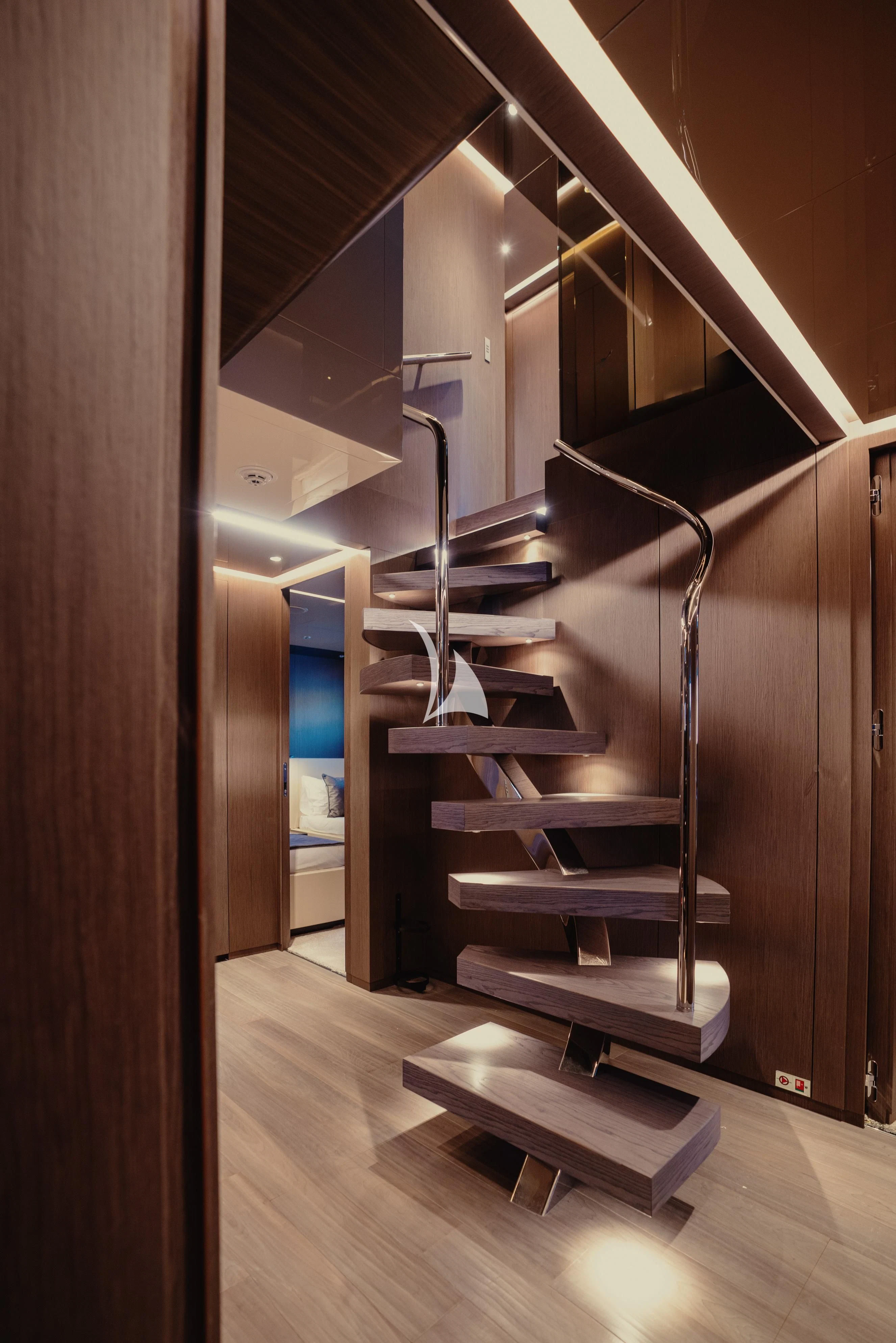 a staircase with a metal railing aboard ALVIUM Yacht for Sale