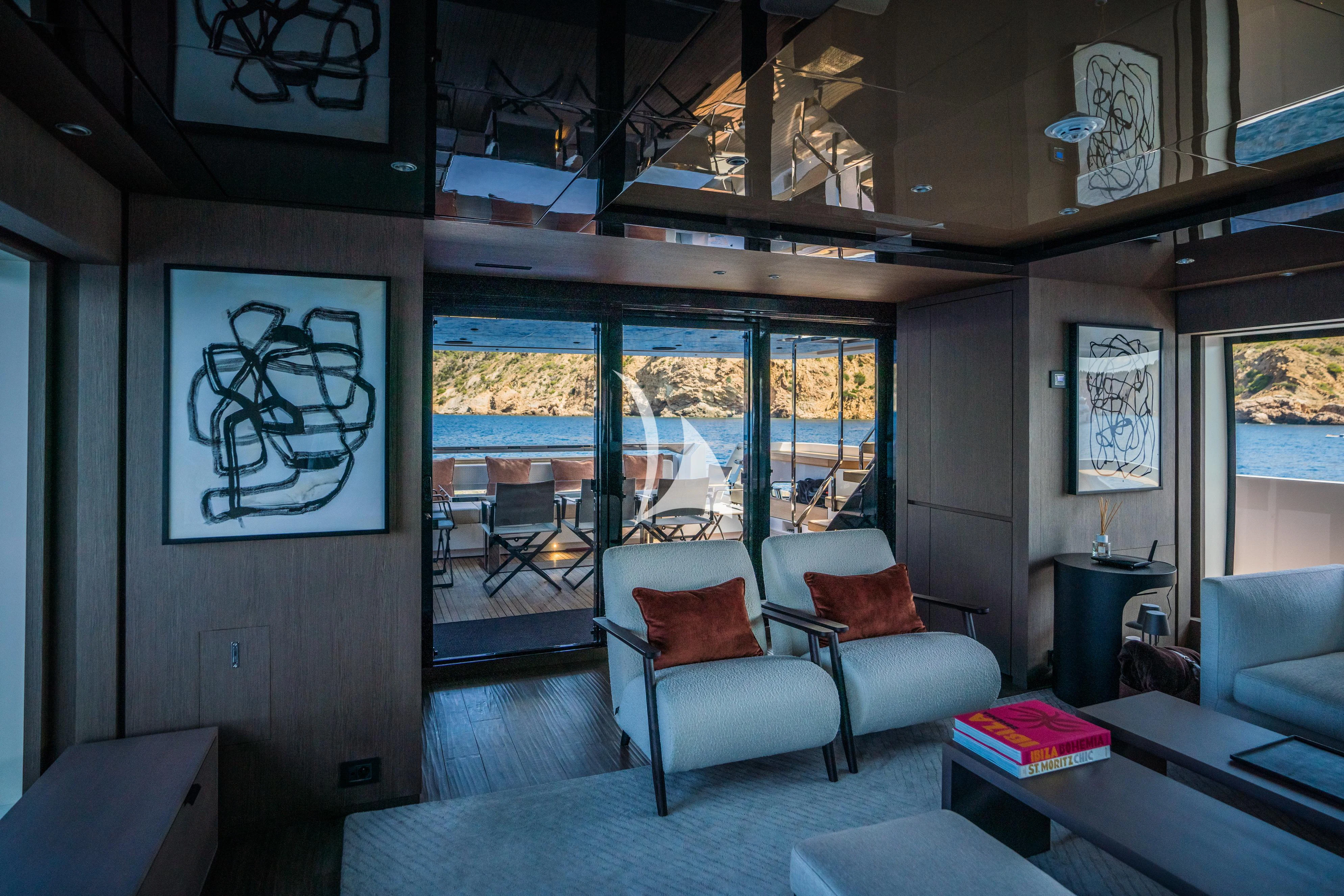 a living room with a large window aboard ALVIUM Yacht for Sale